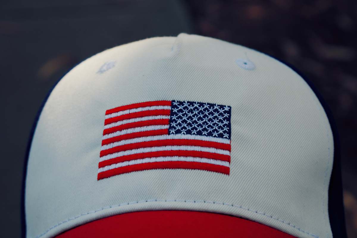 apparel white, red, and blue fitted cap hat