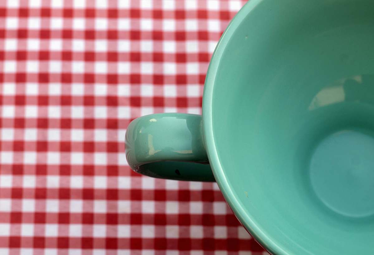 table closeup photo of empty teacup mug