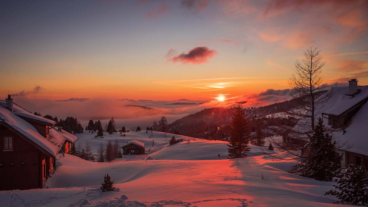 sunrise landscape photography of snow-covered village winter