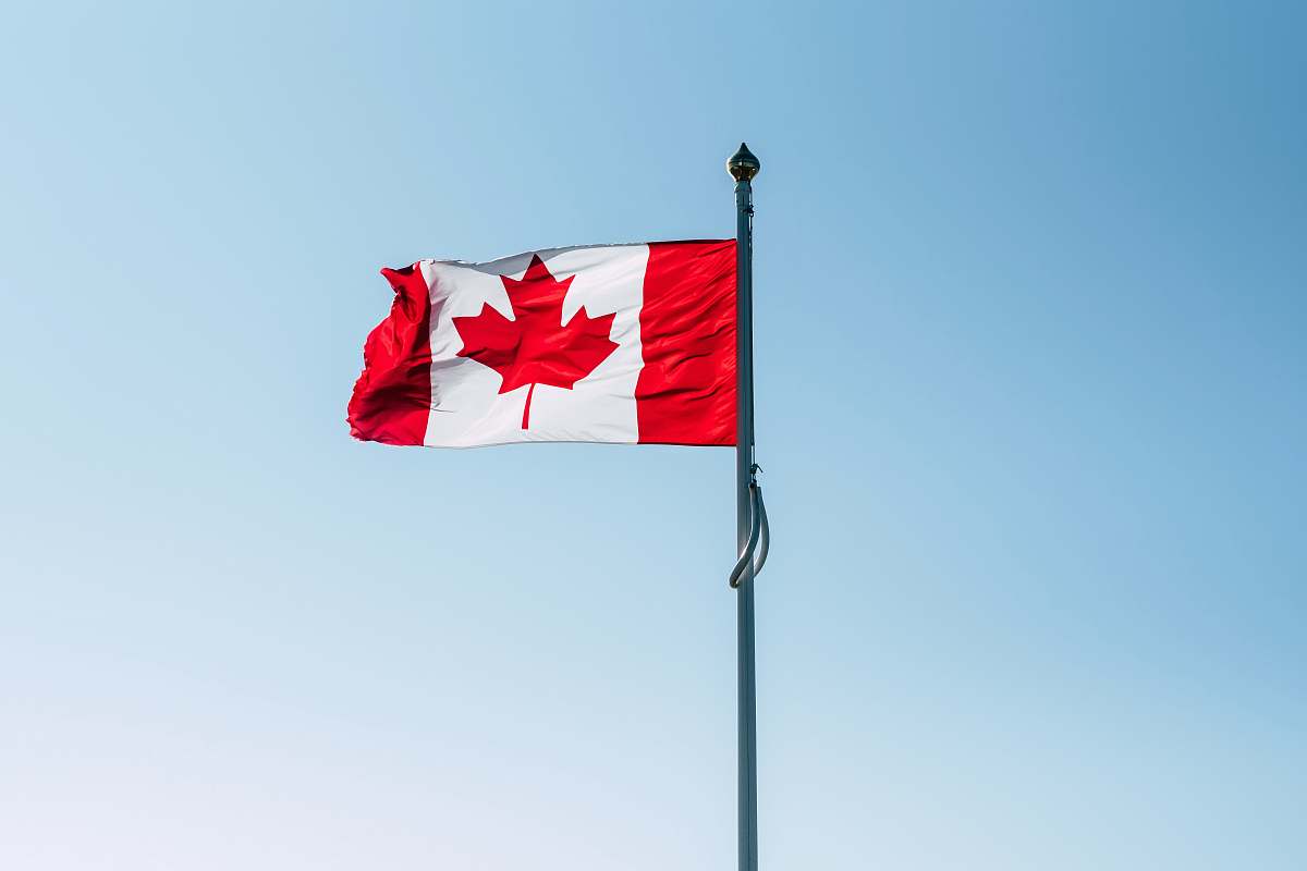 symbol Canada flag on pole during daytime worthing