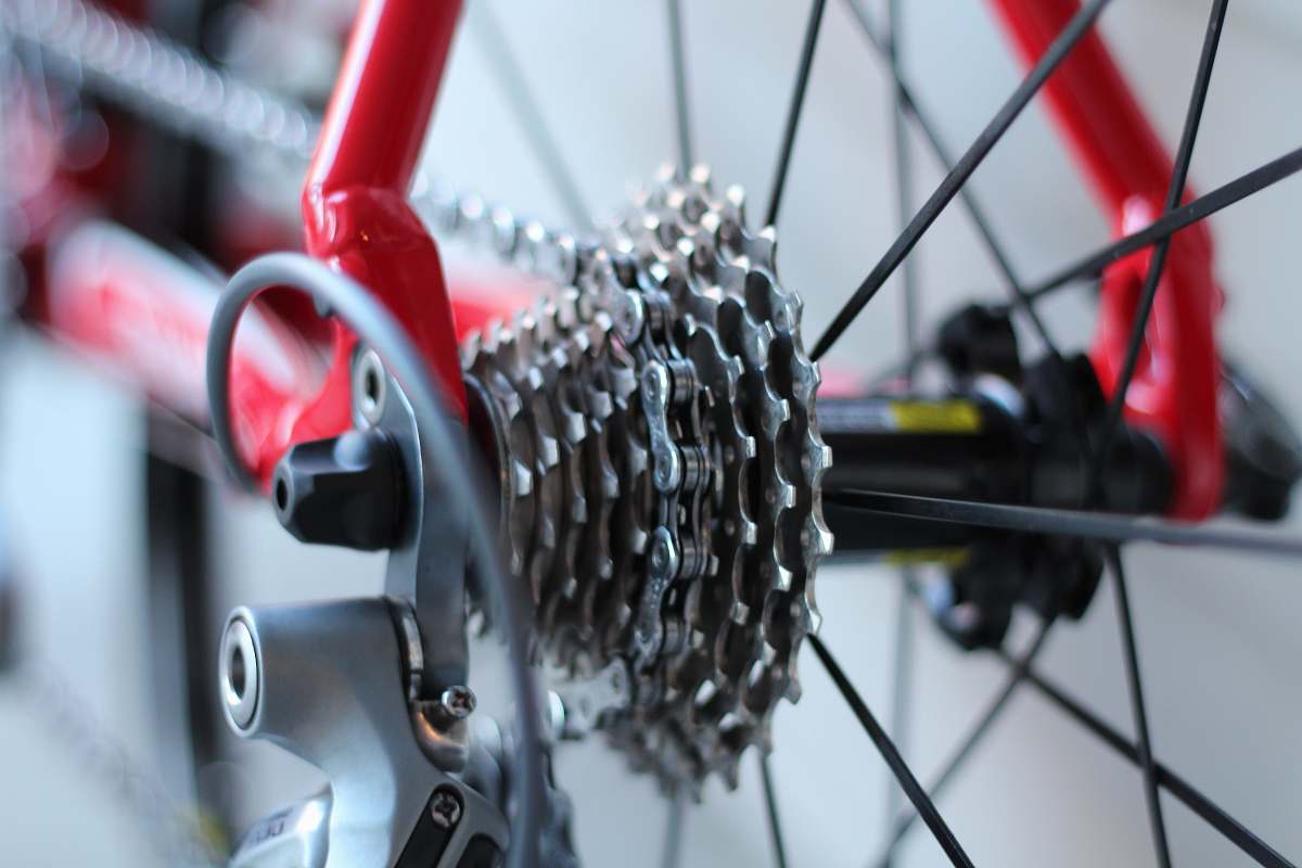 spoke selective focus photo of bicycle part wheel