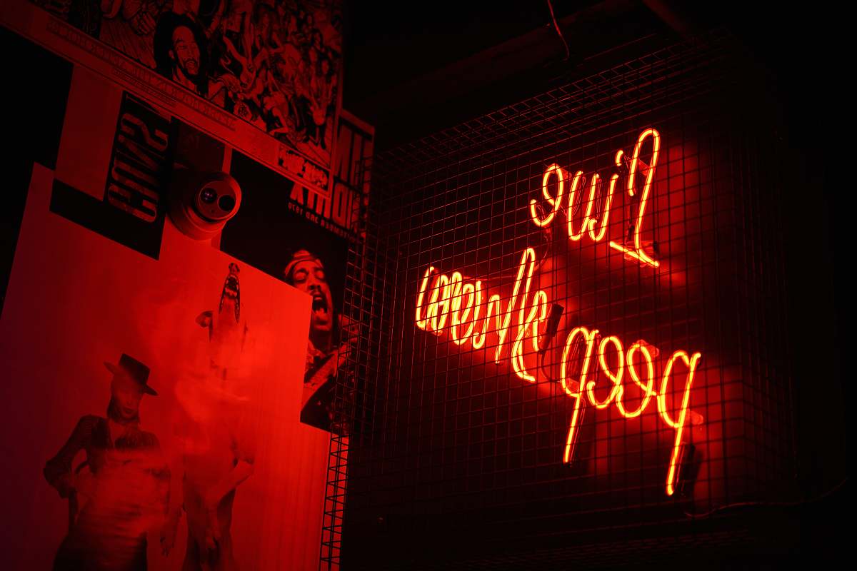 person Live Peep Show neon signage people