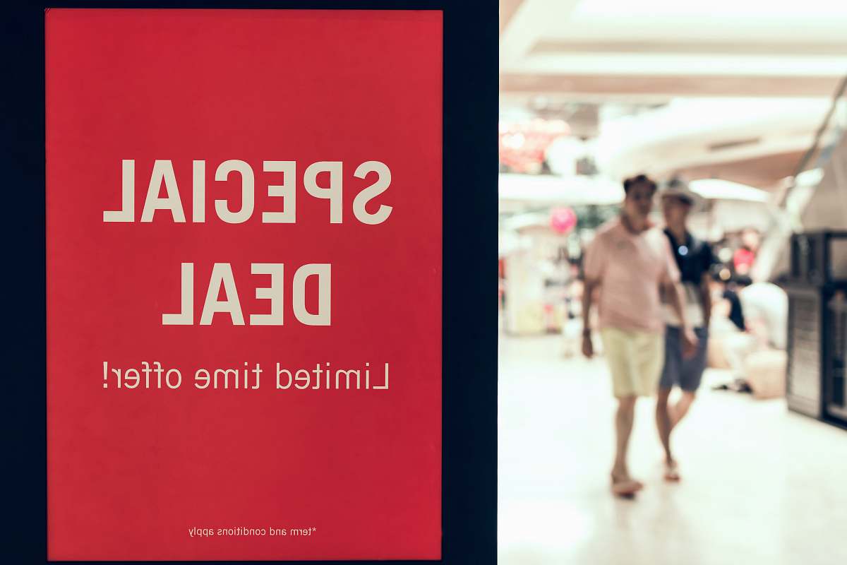 person man walking inside mall collage people