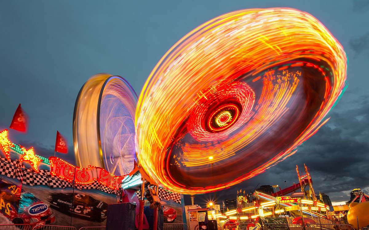 parade multicolored amusement park ride person