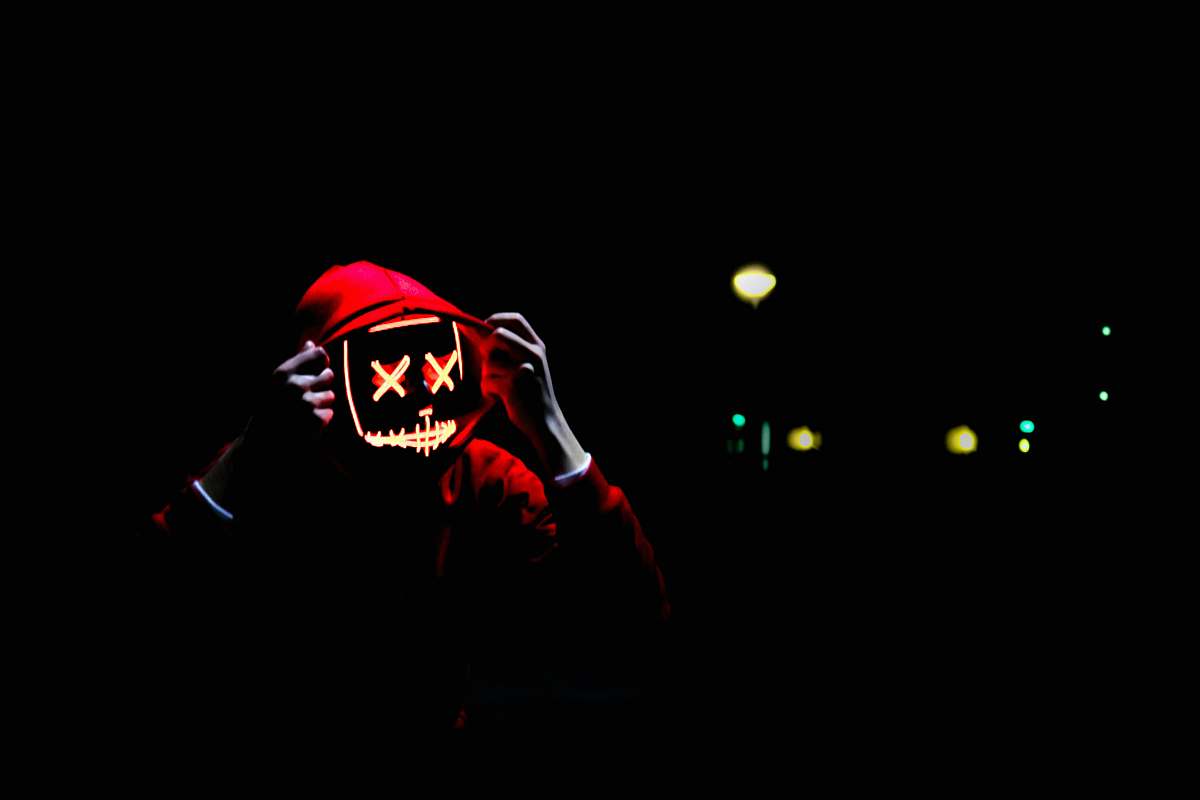 person person wearing hoodie and neon mask netherlands