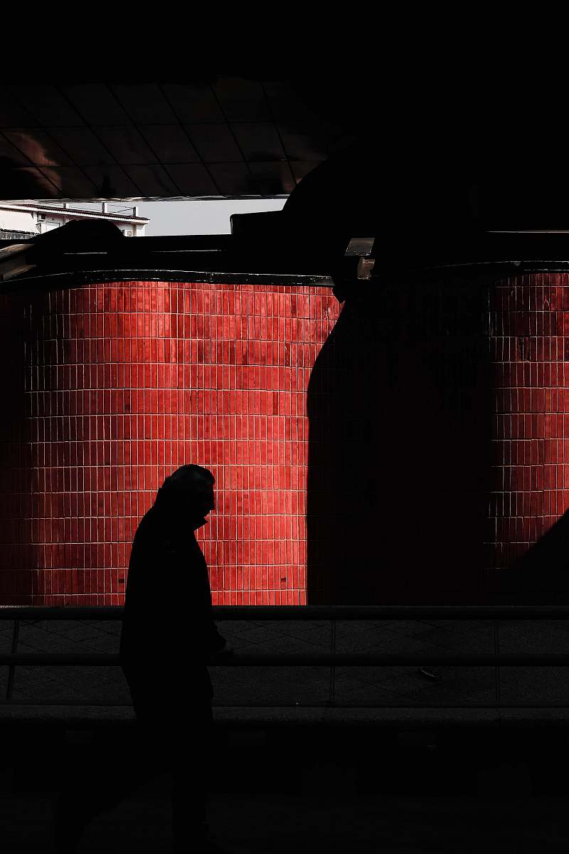 person person's silhouette on front of red wall home decor