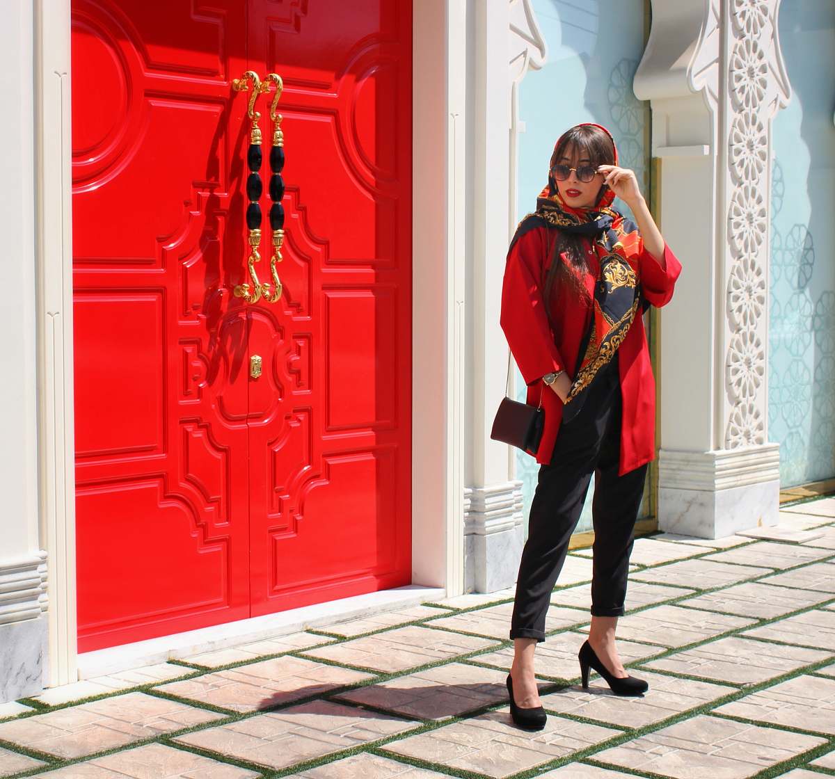 person woman standing near door apparel