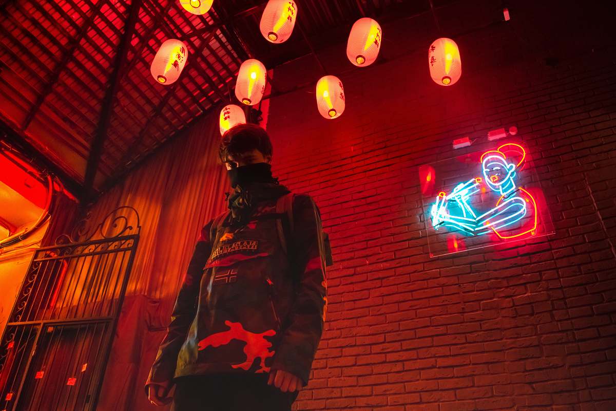 human man under pendant lamps person