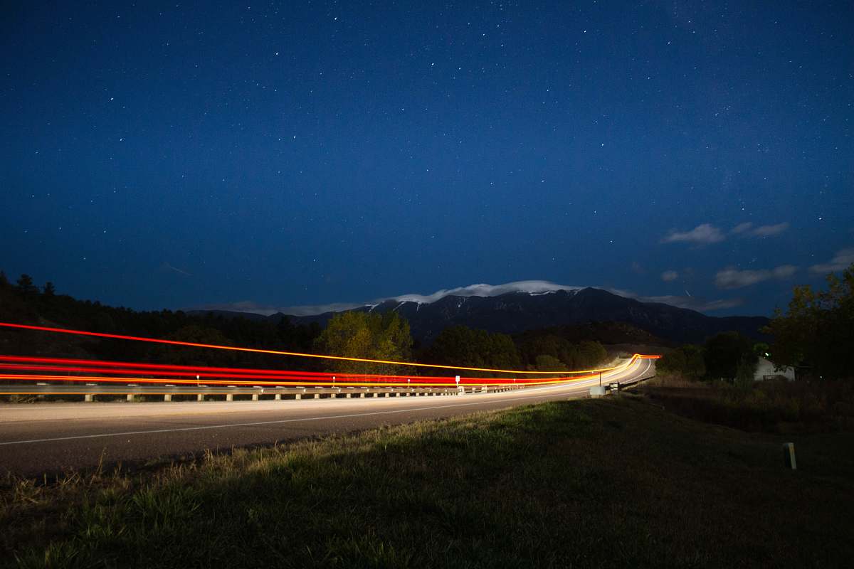 rye time lapse photograph of train under starry sky united states