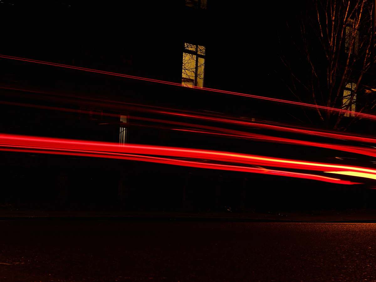 winchester time lapse photography of vehicle passing by the street uk