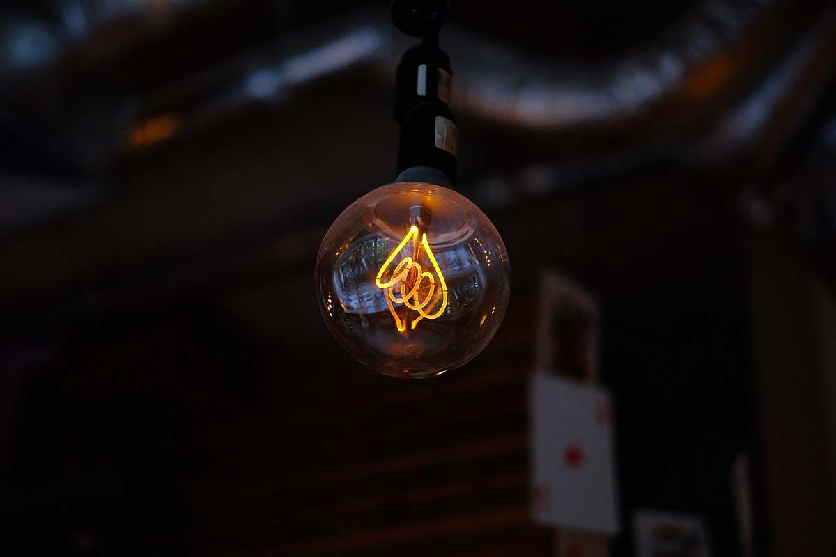lamp turned on light bulb old