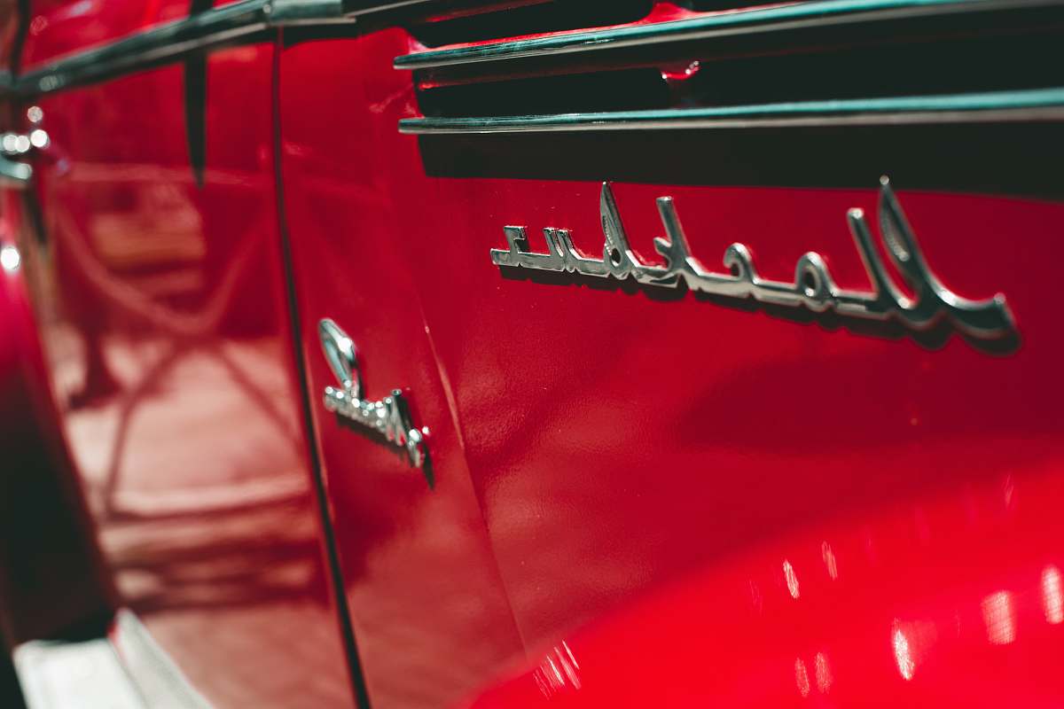 symbol close photo of red car trademark