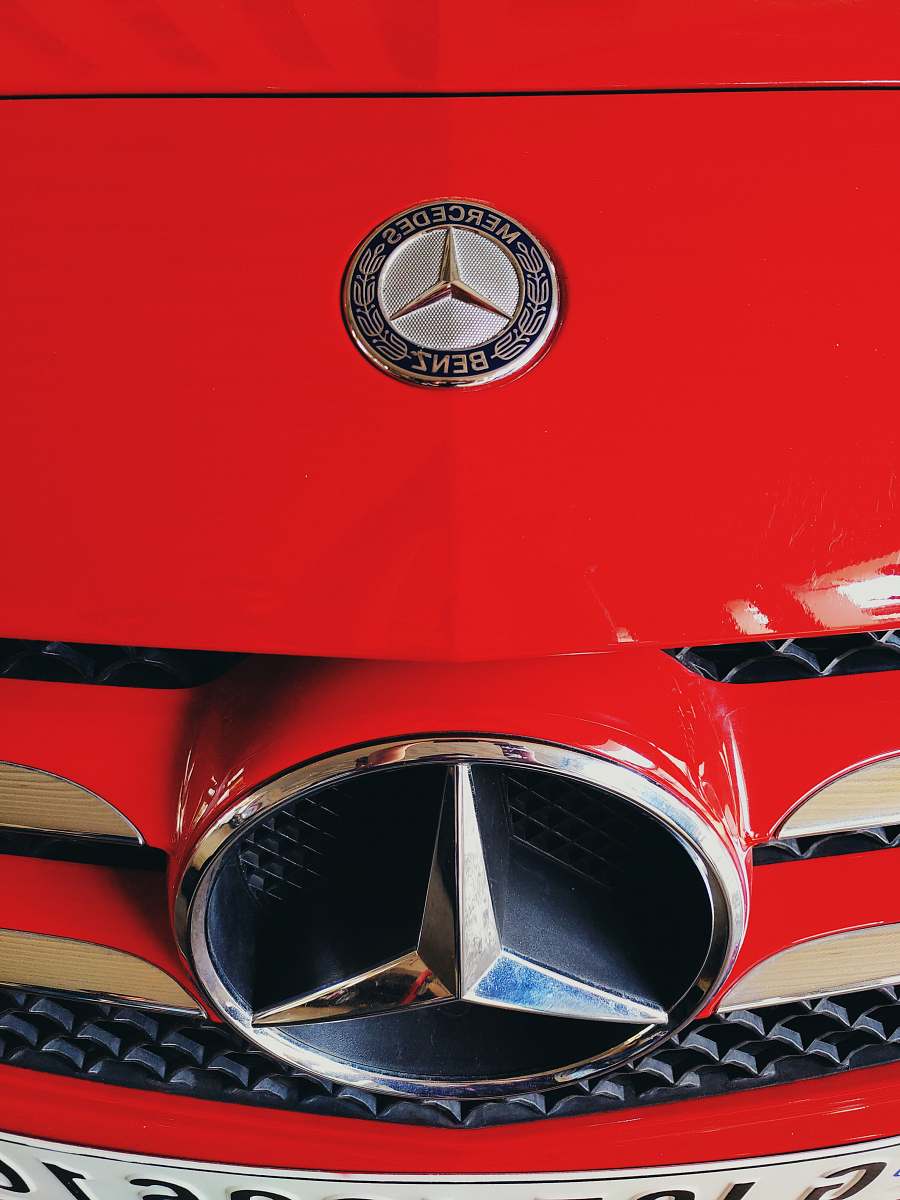 trademark red Mercedes-Benz car symbol