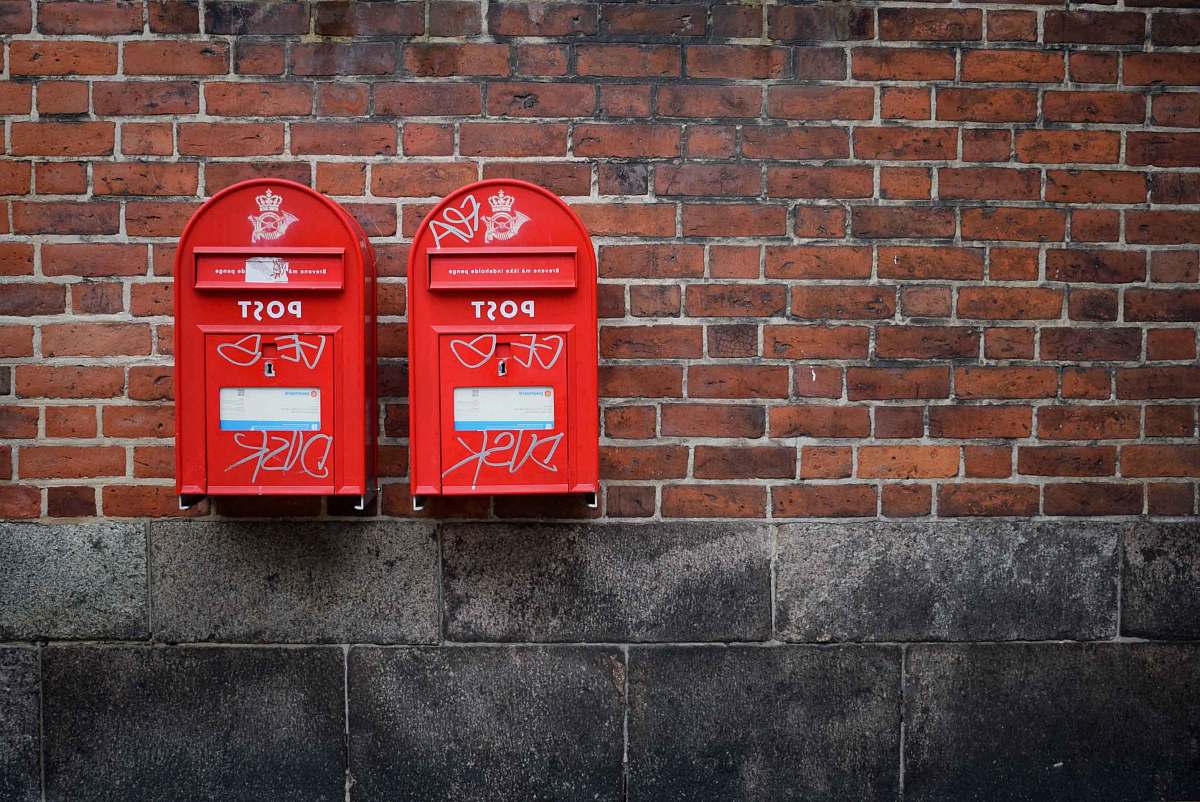 Postbox Photo Of Two Red Post Boxes Mounted In Brown Concrete Wall ...