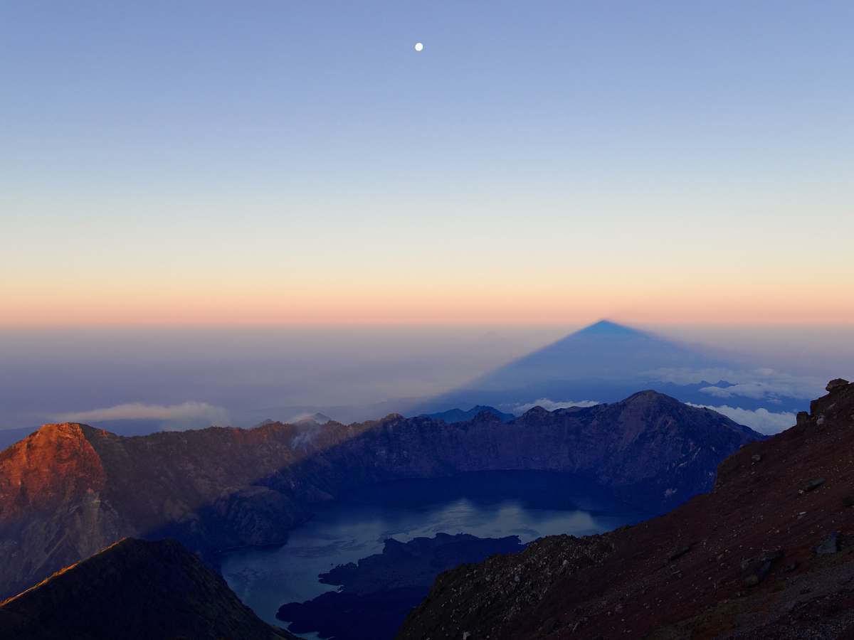 moon aerial view of rocky mountains under blue sky nature