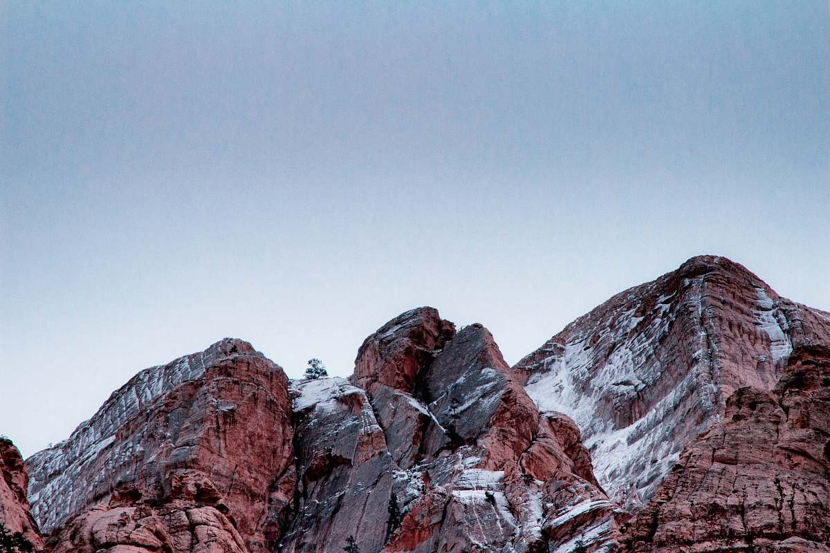 rock landscape photography of cliff crest