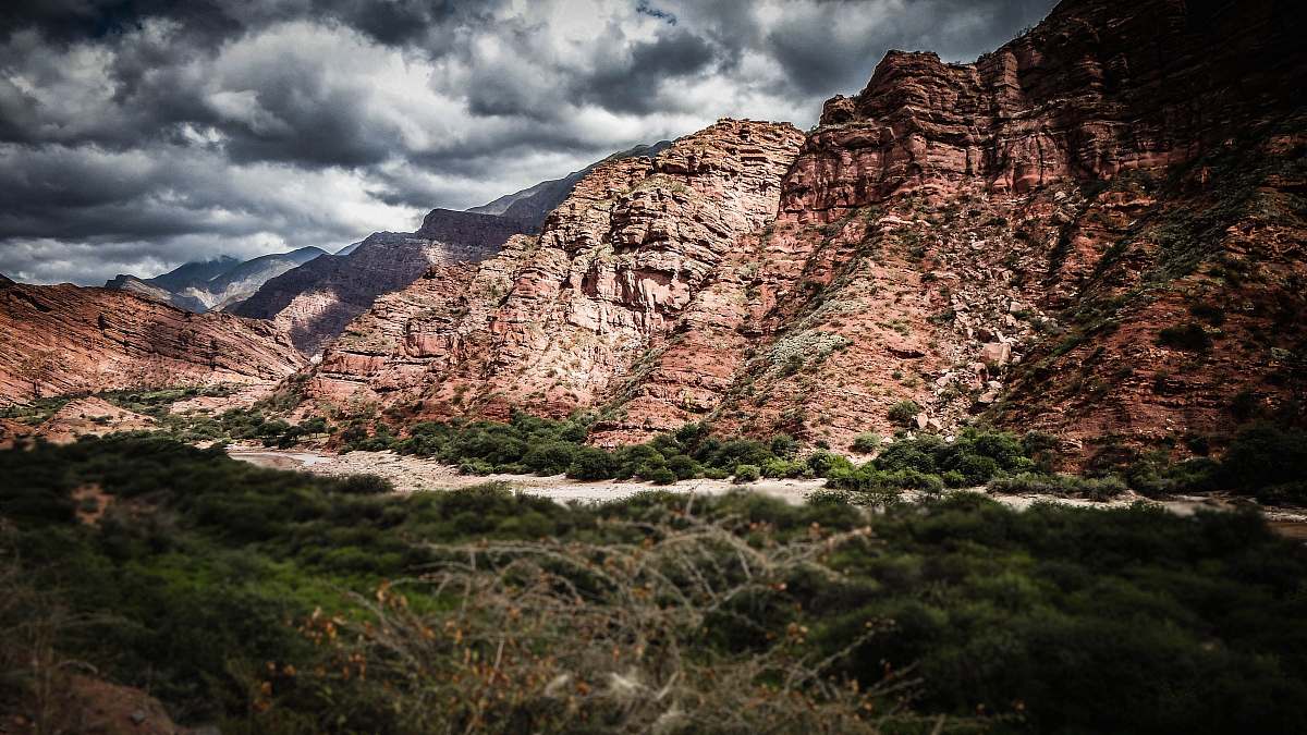 mountains mountain ranges and river with grass canyon