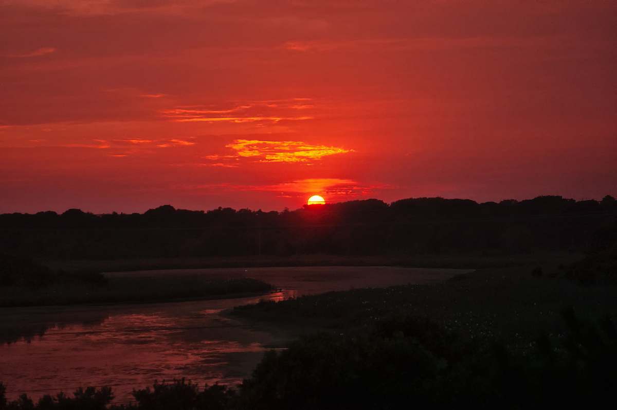 sunset body of water during sunset outdoors