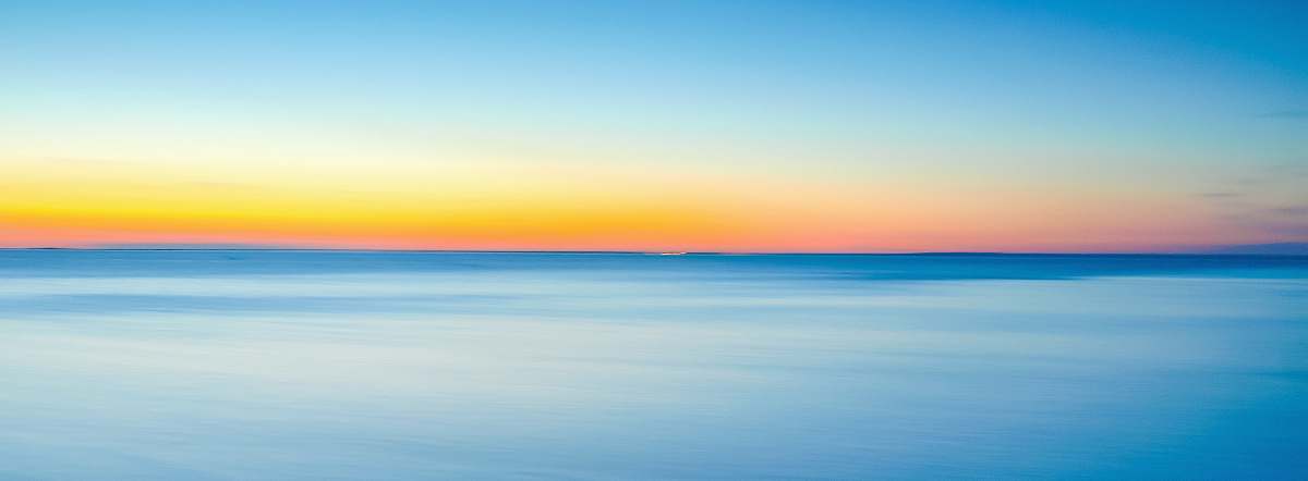 sunset body of water photo landscape