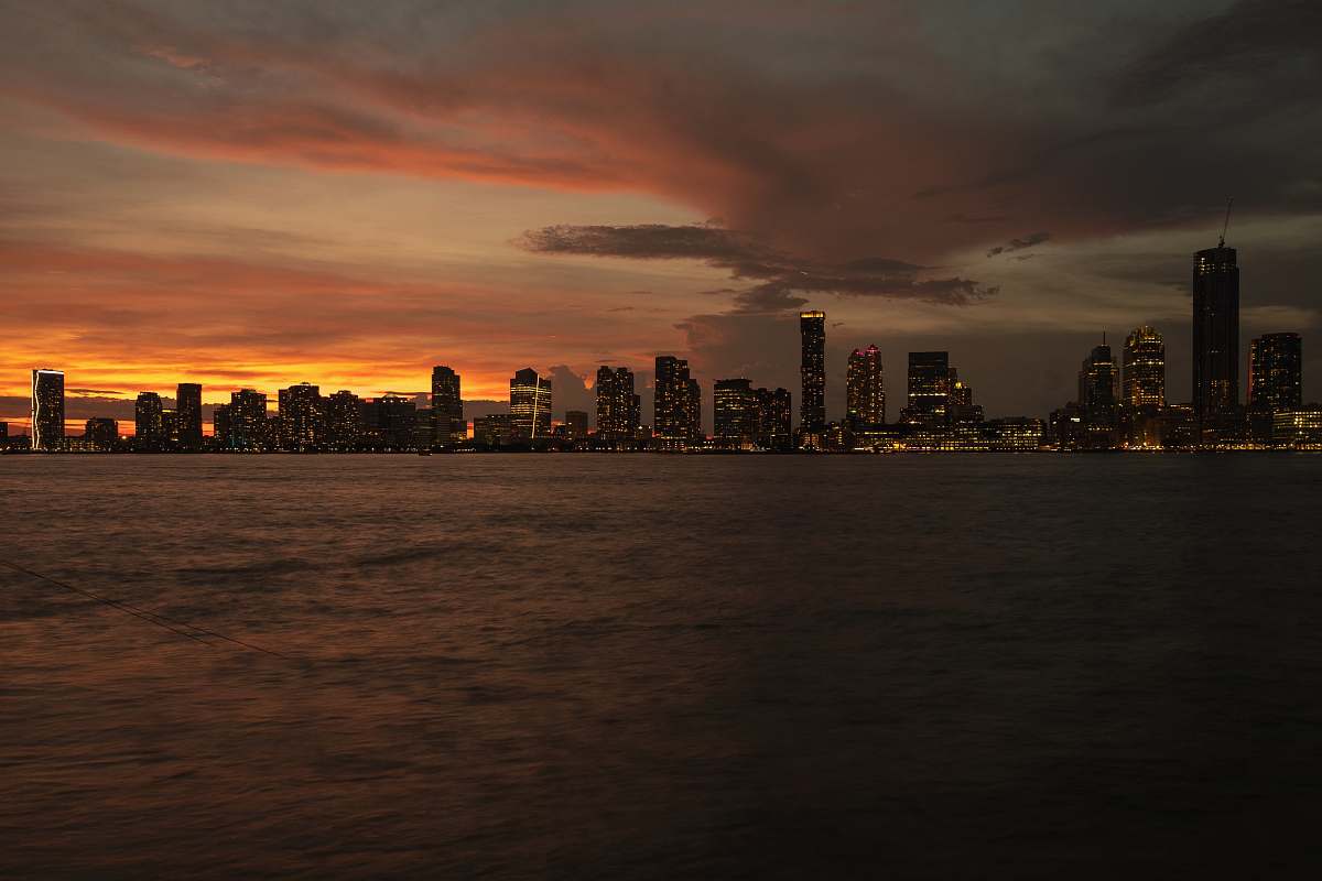 dusk cityscape photography of high-rise building during golden hour dawn
