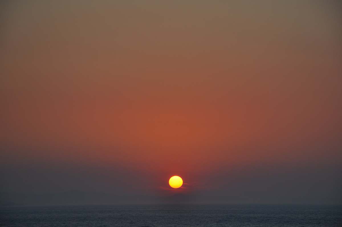 outdoors orange sun and body of water sun