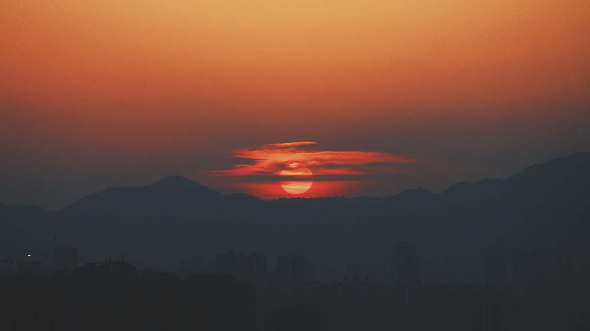 sunset silhouette mountain during sunset sky