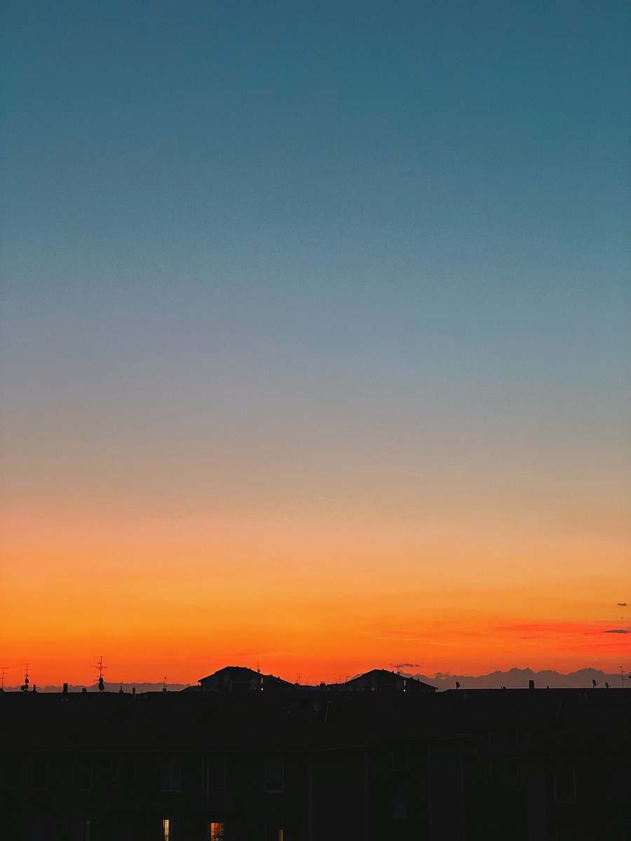 sunset silhouette of mountain during golden hour sky