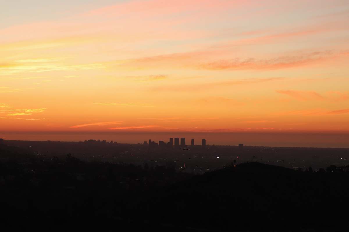 outdoors silhouette of mountain under orange sky sunset