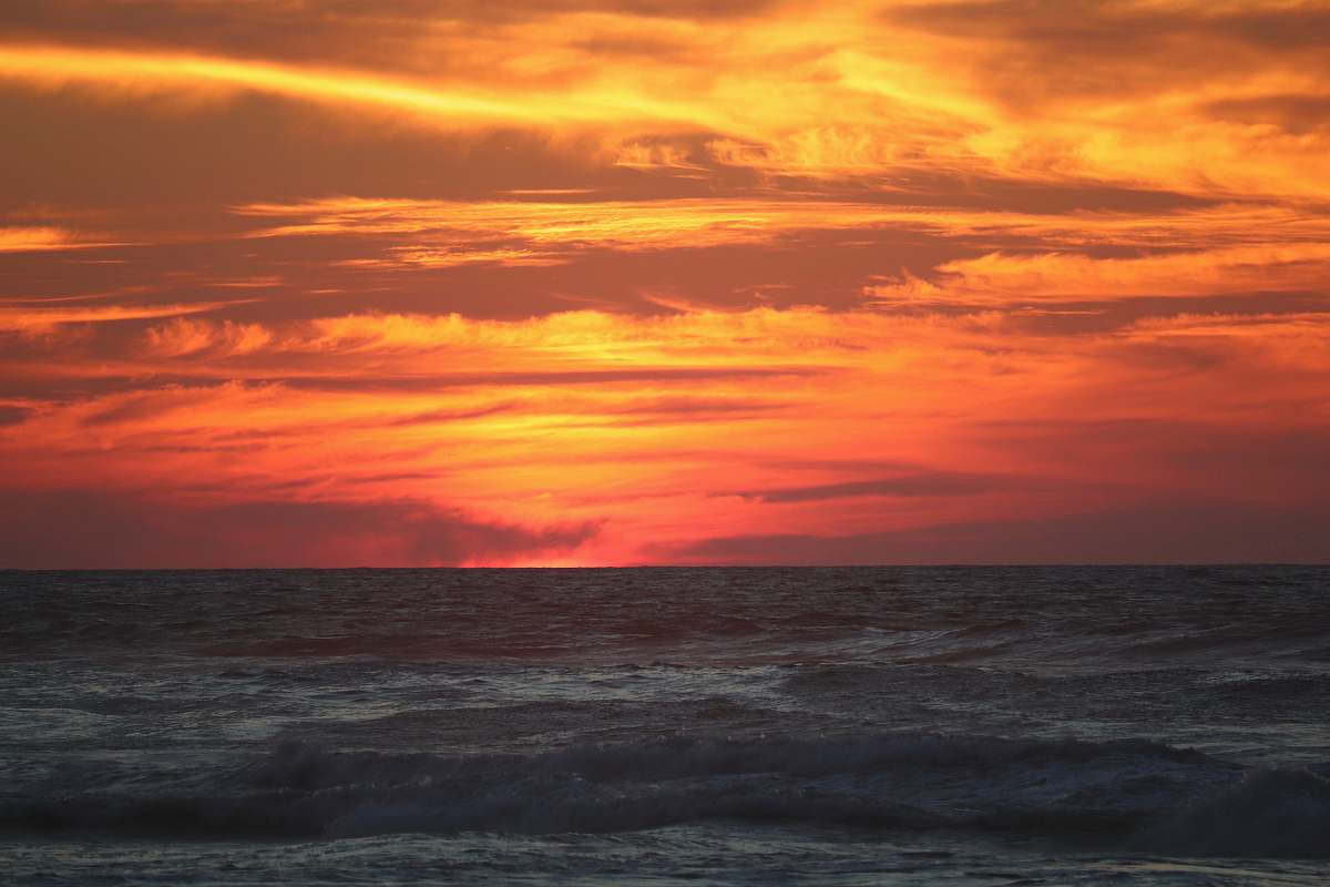 outdoors sunset over body of water sunset