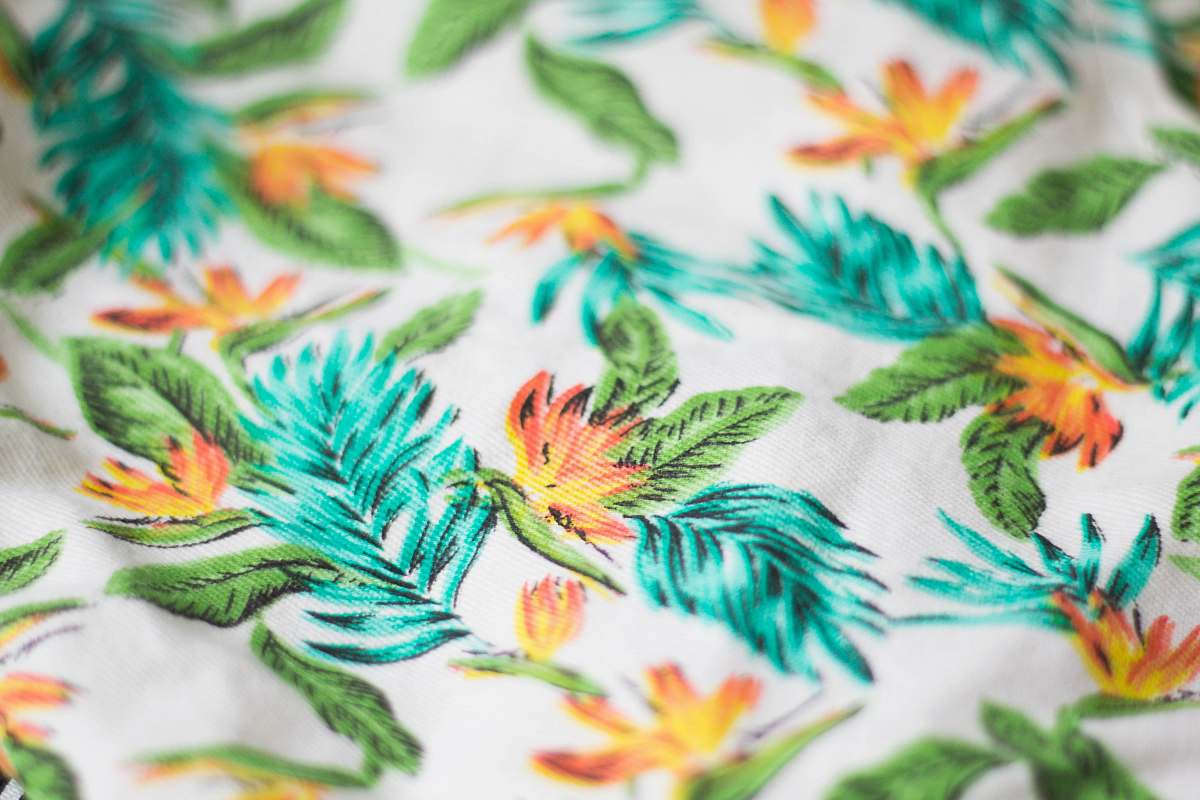 fabric white, green, and teal floral textile print