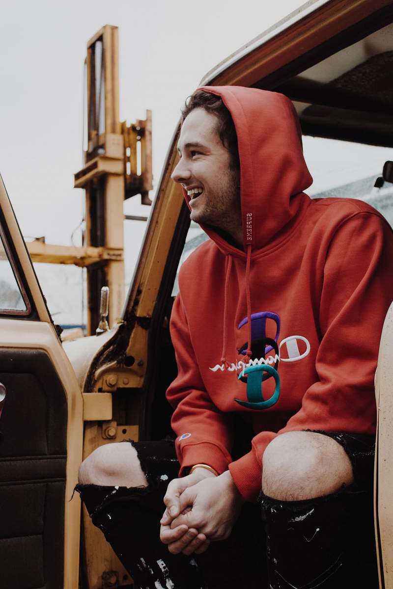 human man sitting inside car person