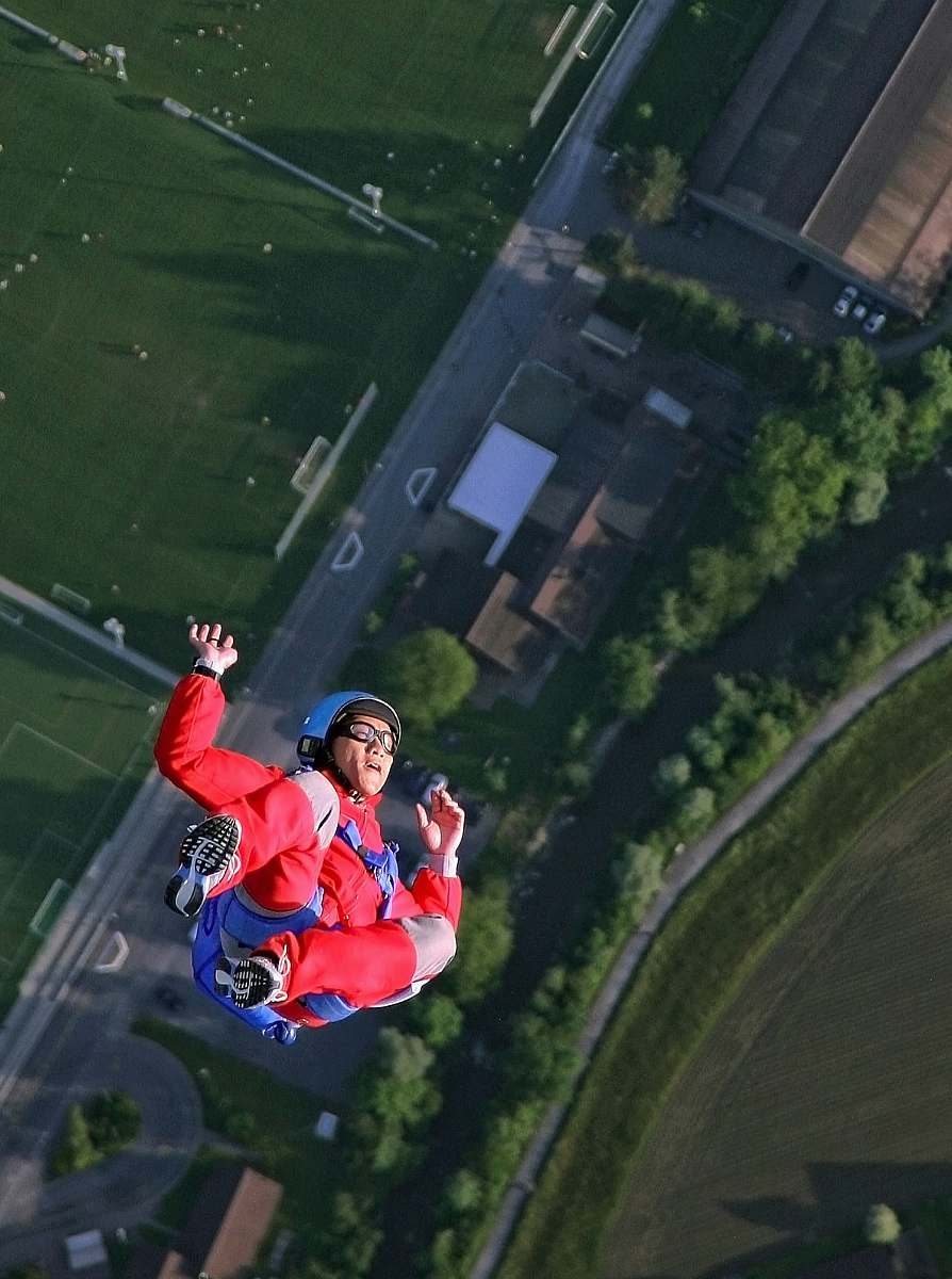 person woman on flip position sky diving human