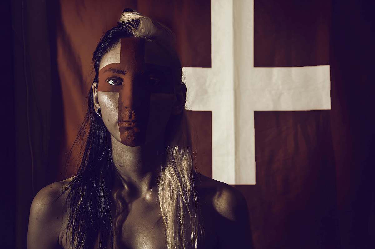 human woman with cross flag person
