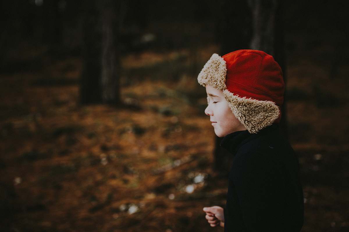 human boy with close eyes on vignette photography people