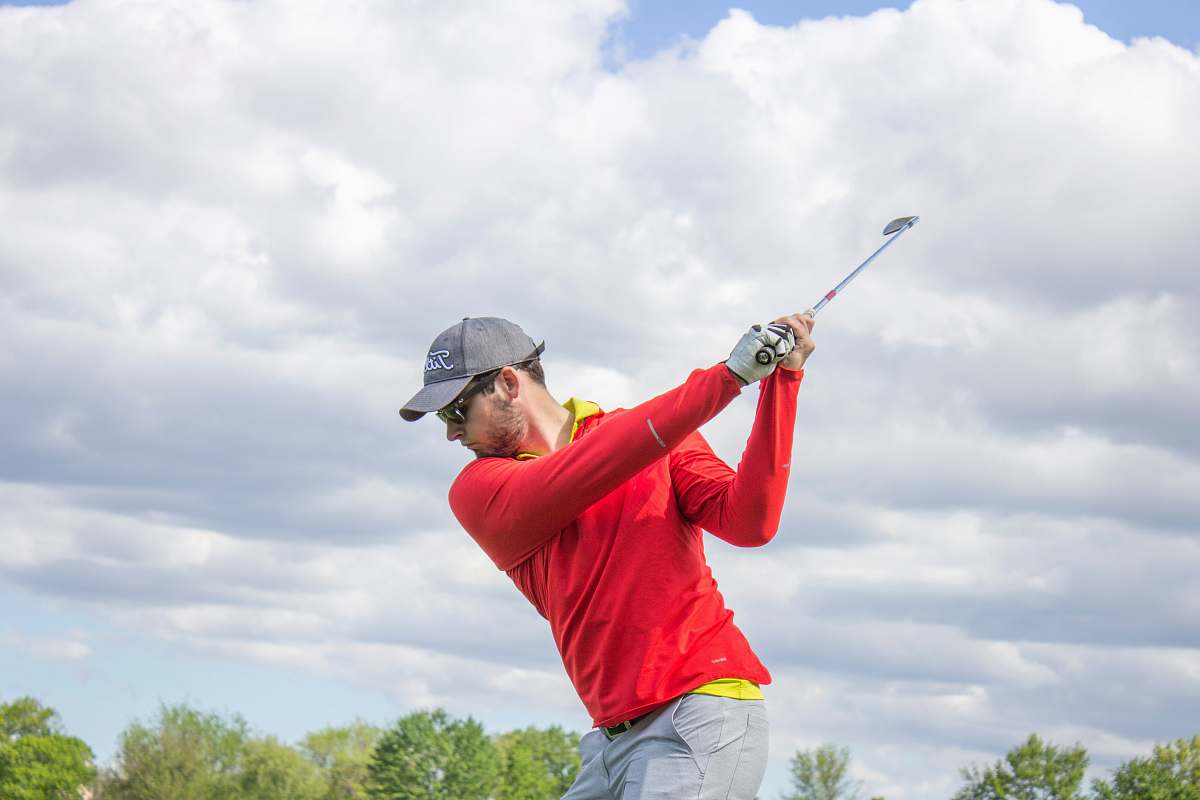 human man holding golf club people