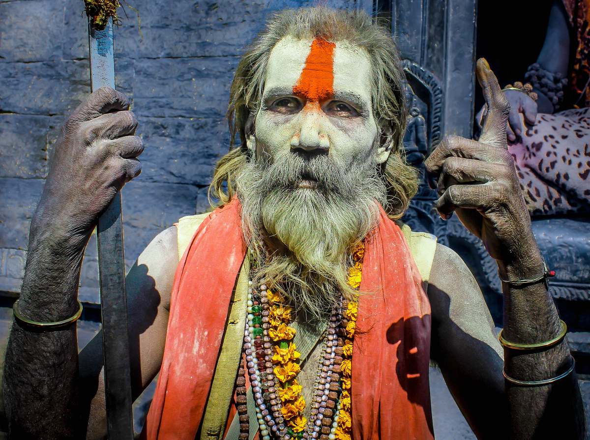 people man holding gray rod human