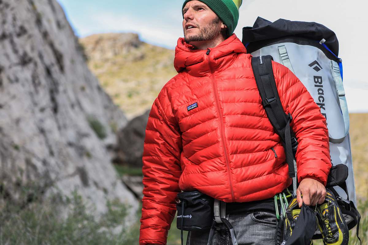 man man looking above carrying gray camping backpack male