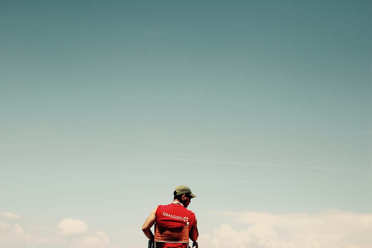 human person under sunny sky lifeguard