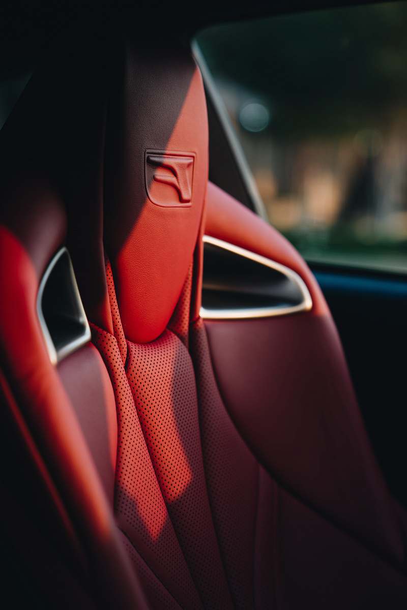 human red leather car seat people