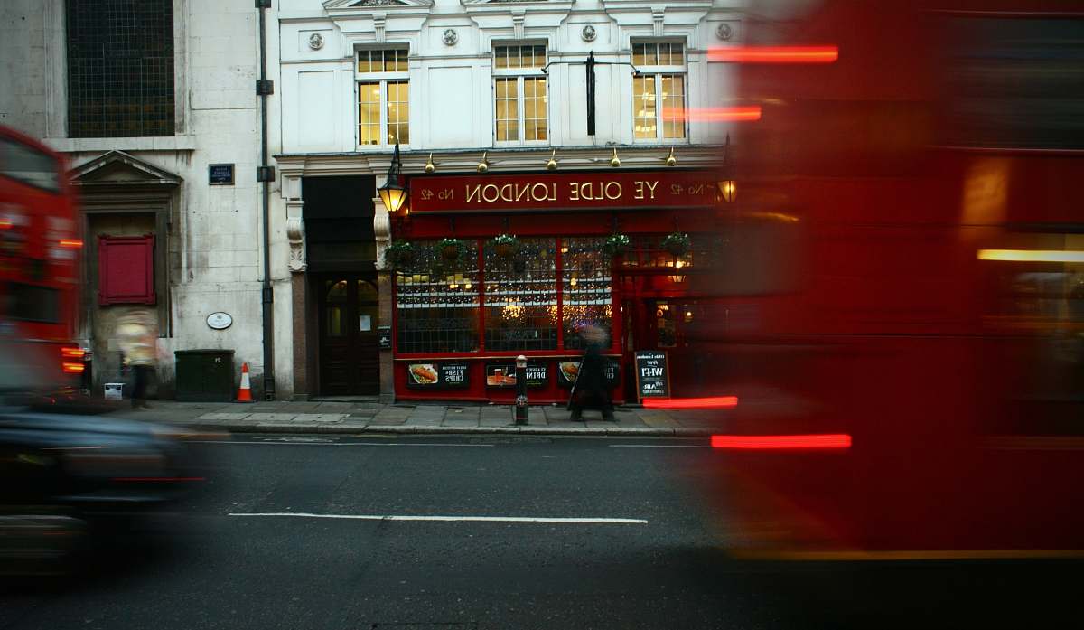 london A motion blur in London street in front of a shop, London bus