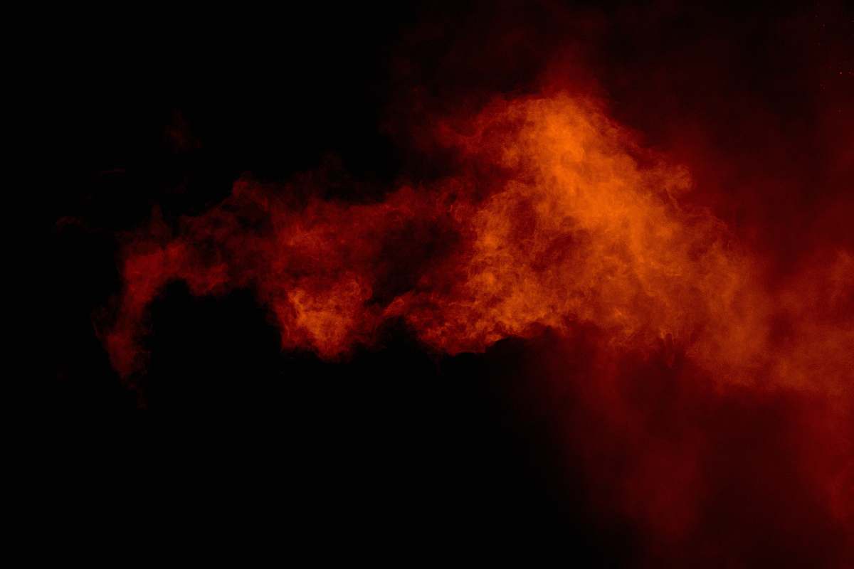 smoke brown smoke on black background fire