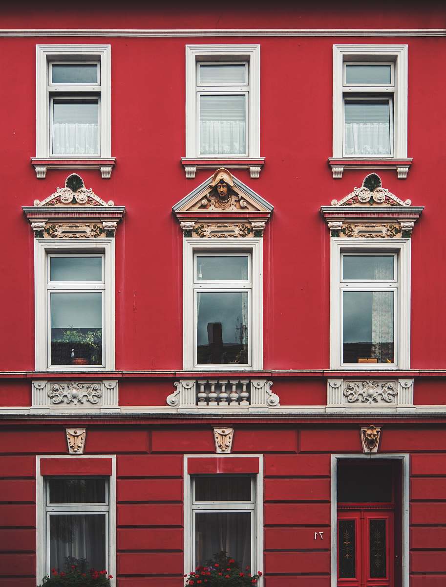 window closed windows on red house building
