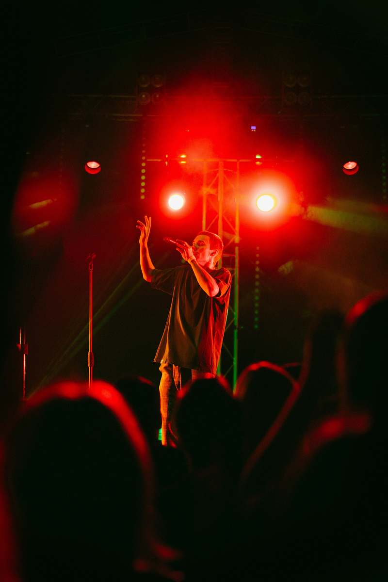 light man performing on stage male