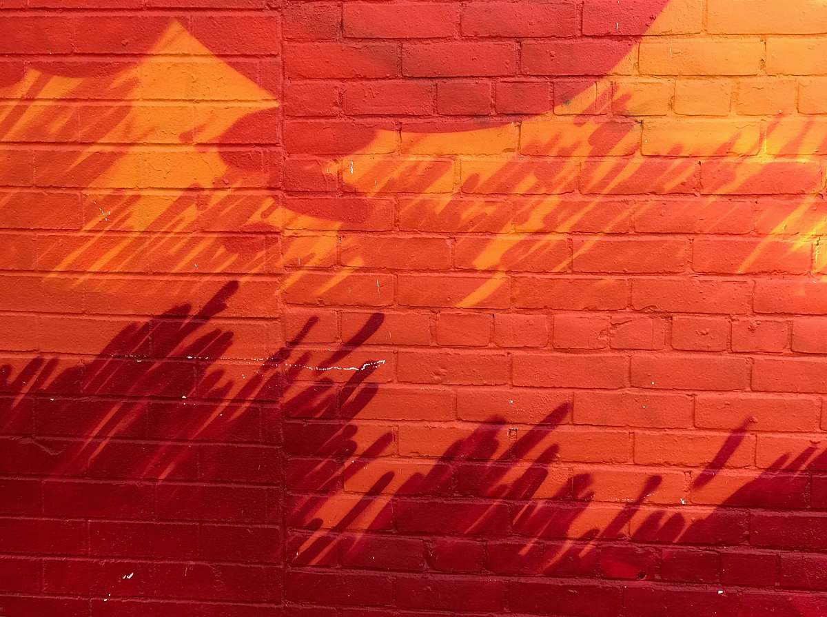 background red and orange painted brick wall brick