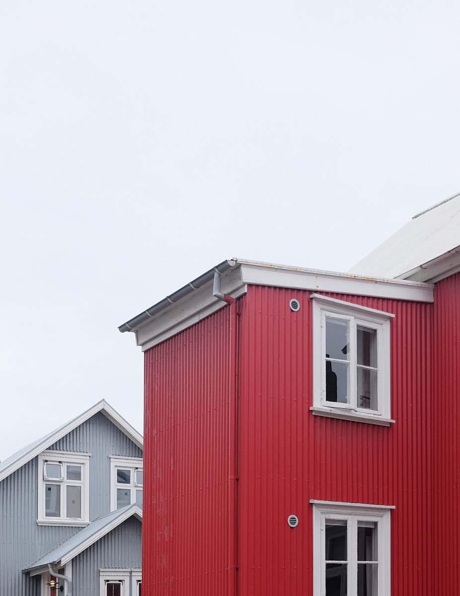 window red and white house building