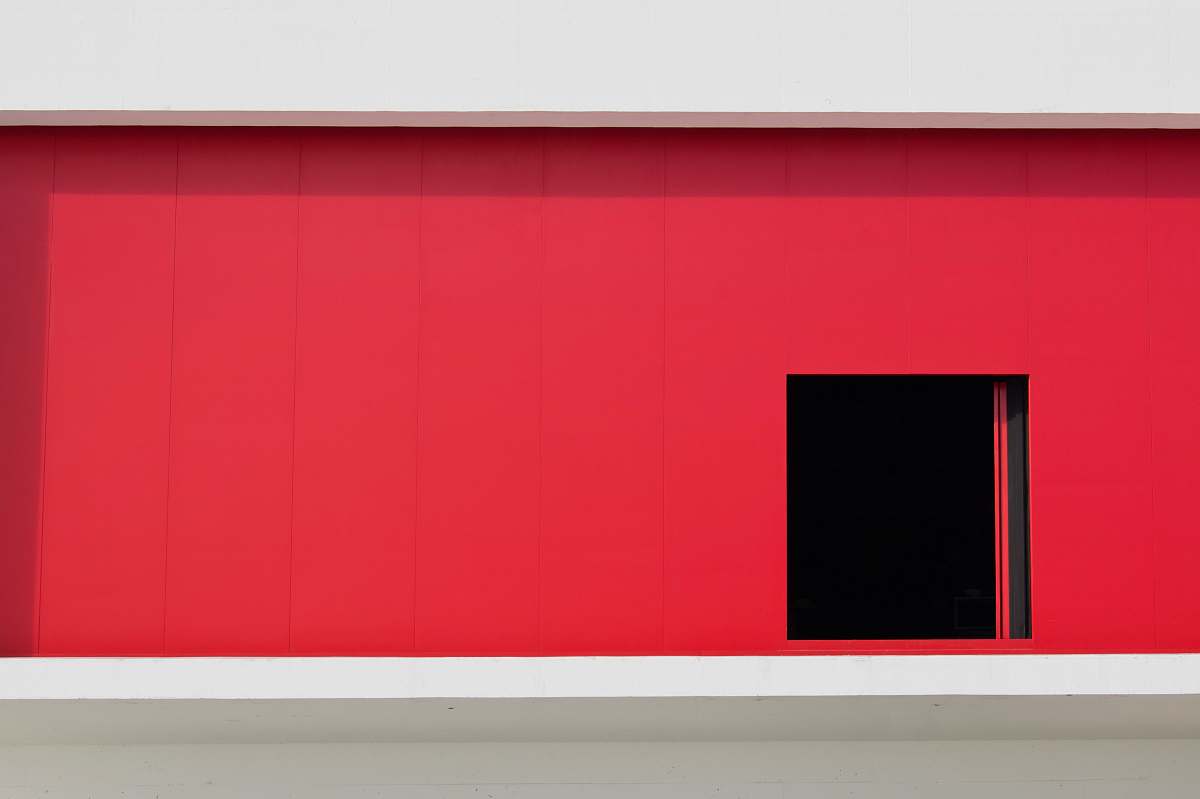wall red building with door spain