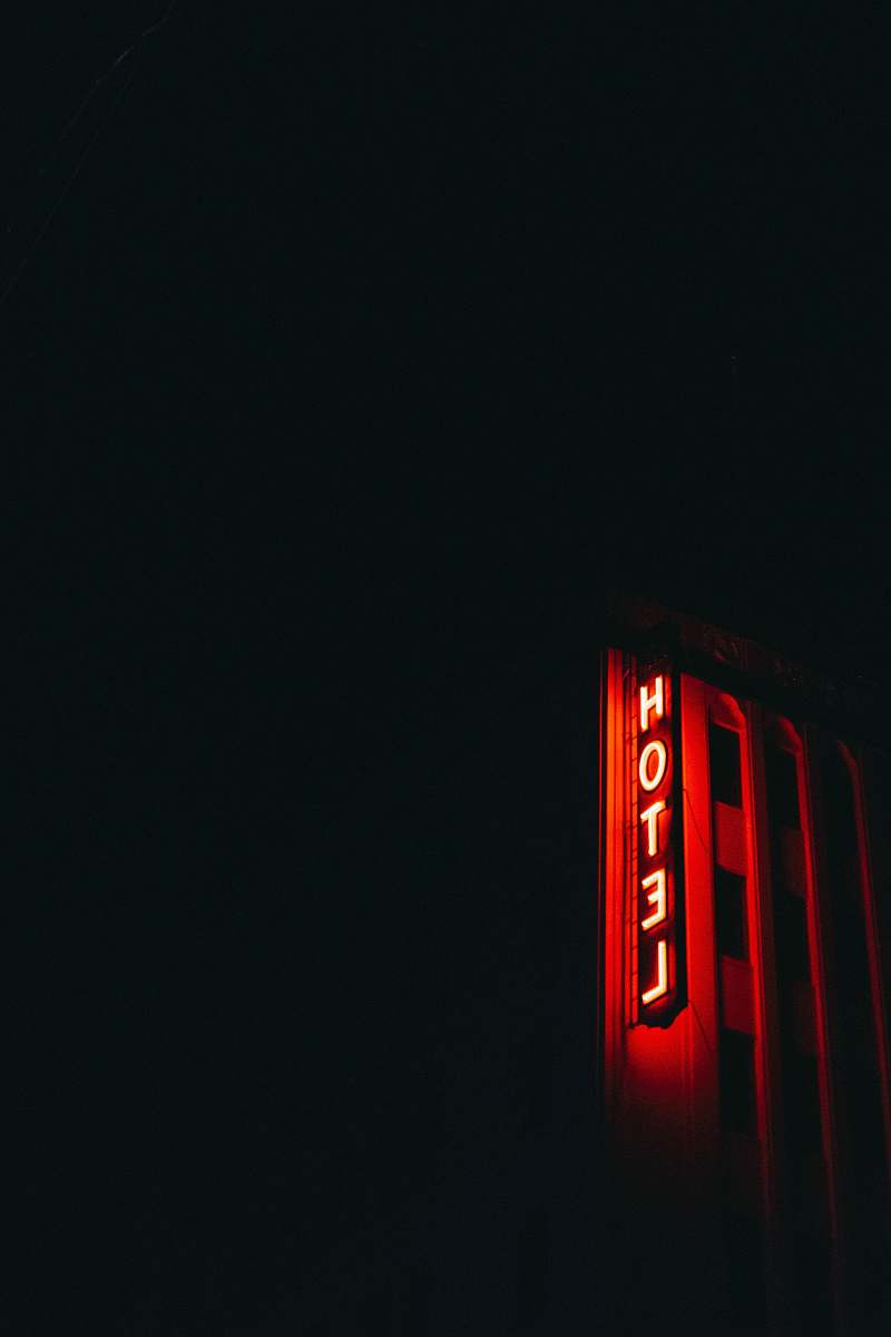 building red LED hotel signage light