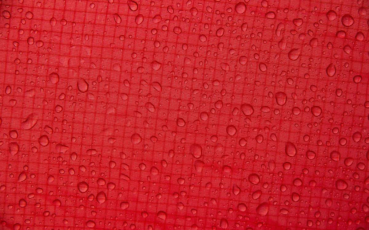 rug red textile text