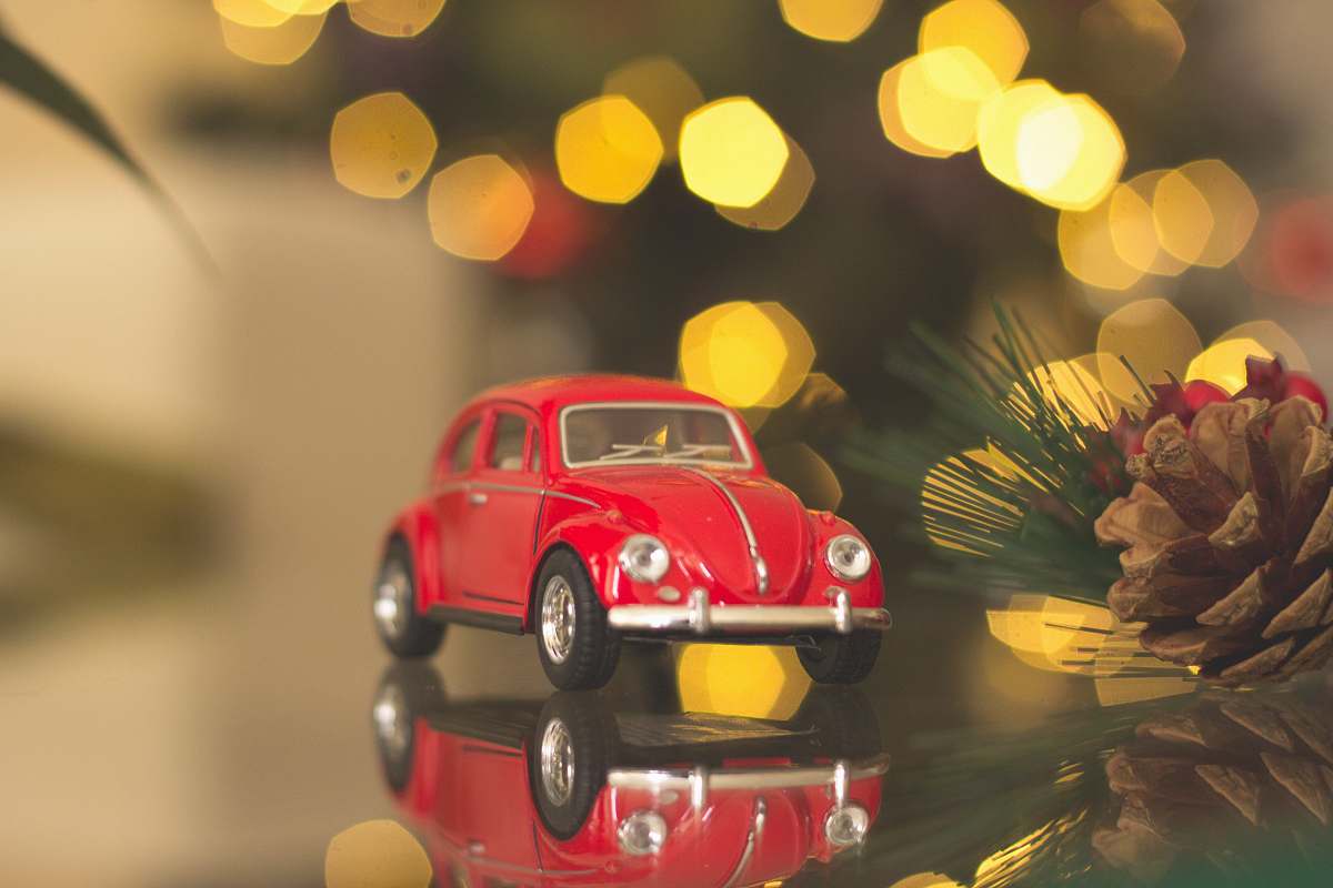 car red Volkswagen car die-cast model on table christmas