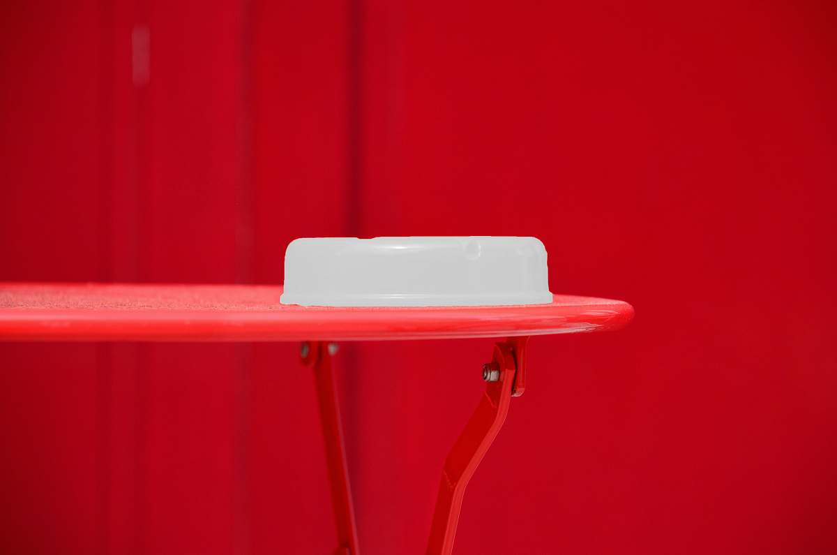 chair round white plastic container on red table furniture